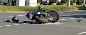 Motorcycle accident at an intersection.